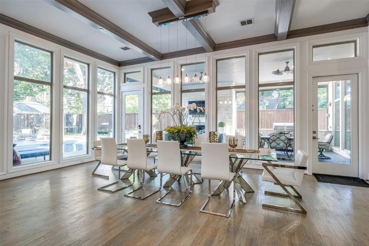 Dining room with a large glass table.
