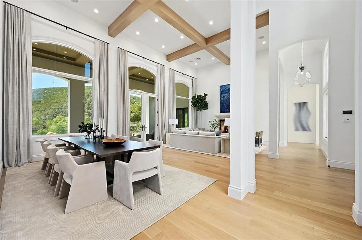 Dining room with a large wood table.