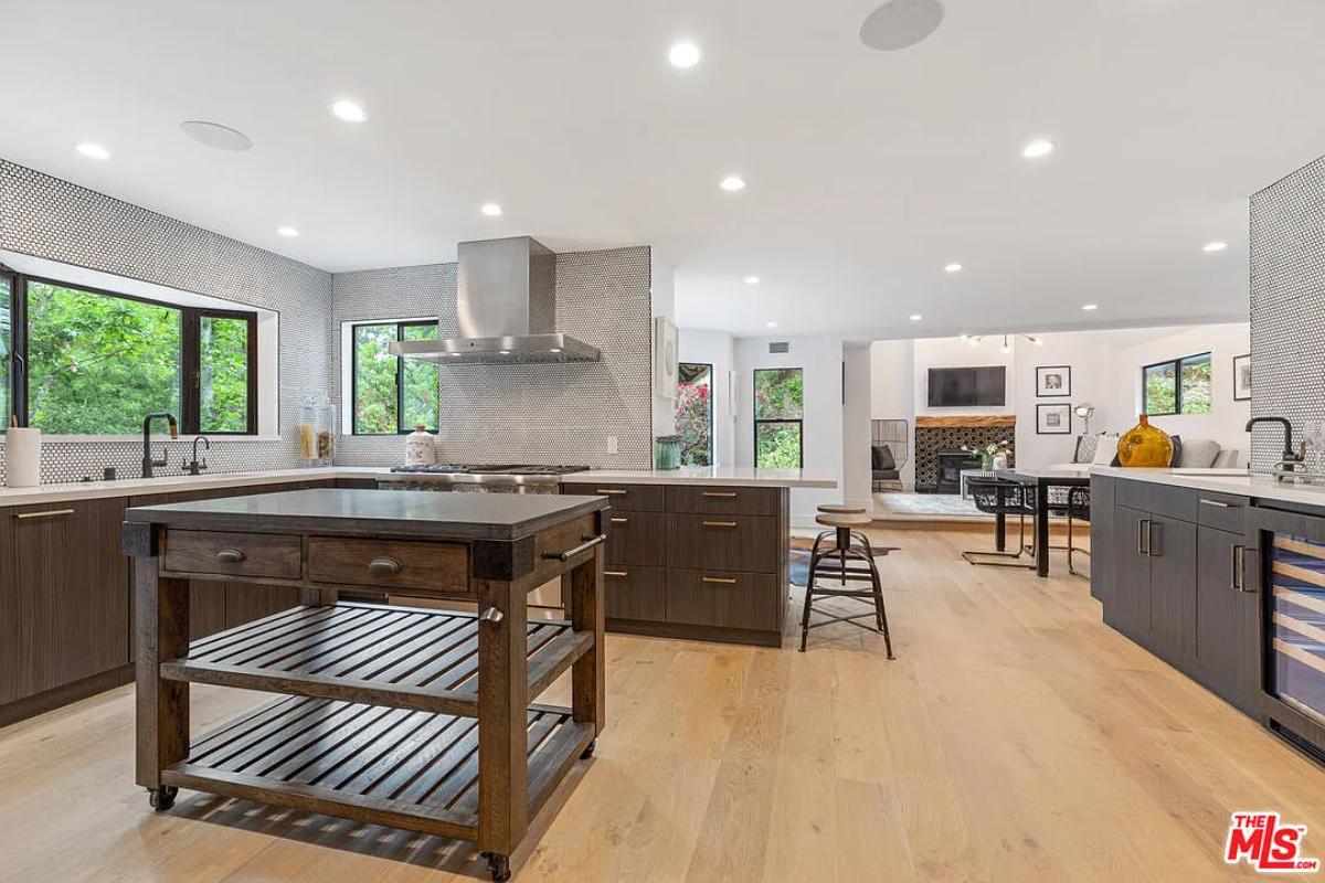 Kitchen with custom cabinetry and a center island prep area.