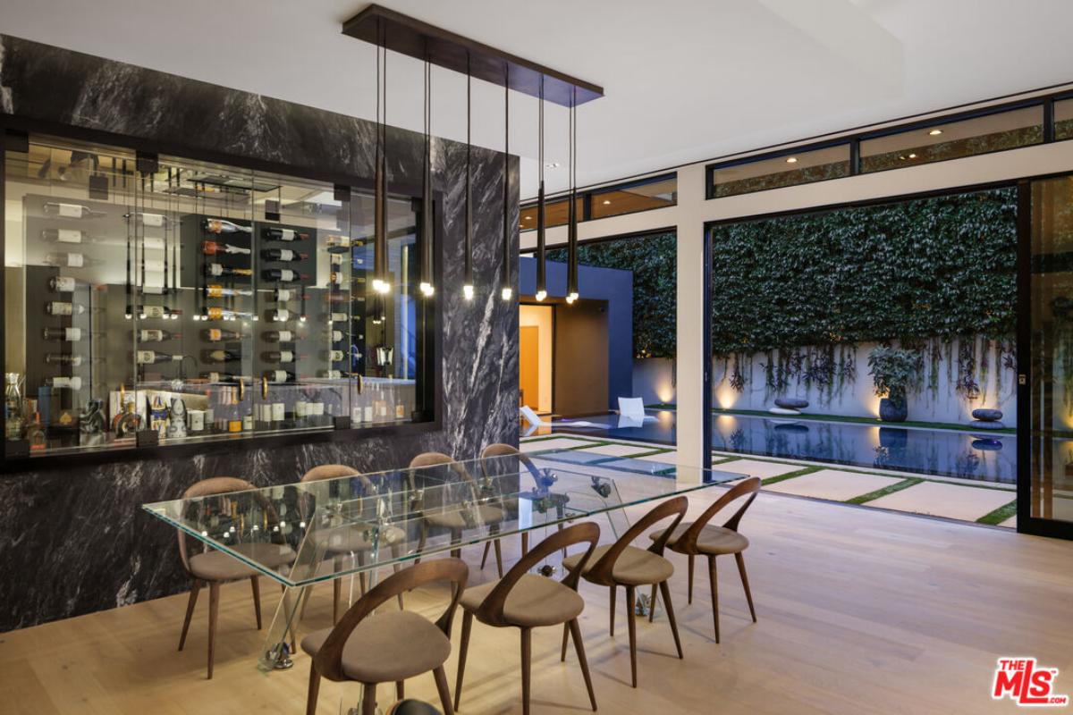 Dining room with a large glass table.