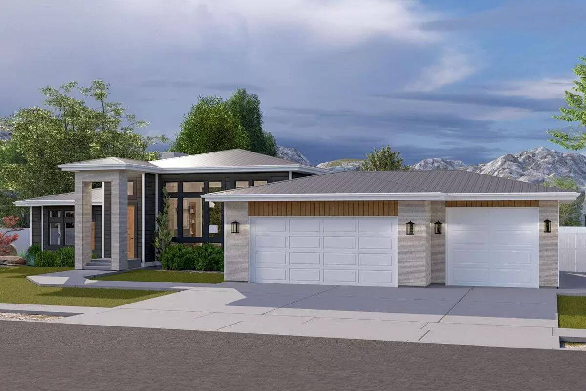 Front-right view showcasing the 3-car garage and concrete driveway.