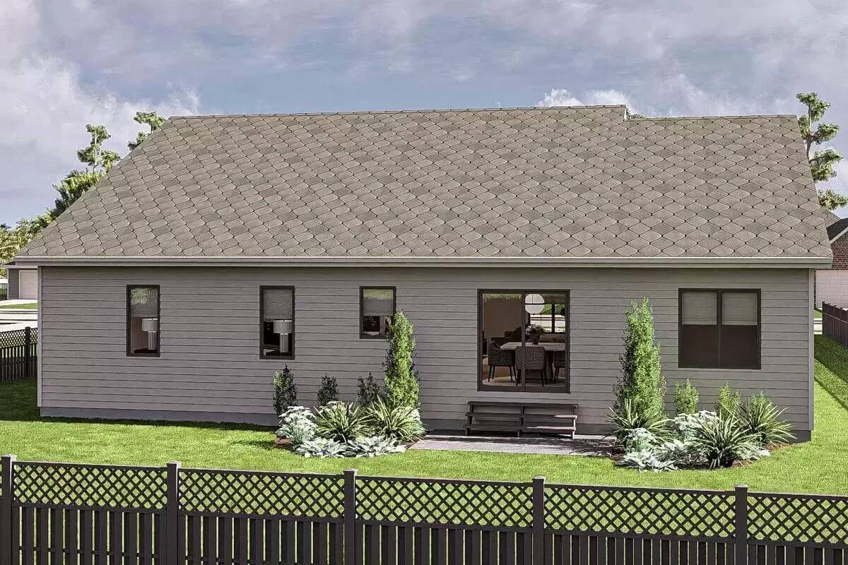 Rear view with sliding glass doors and a concrete patio.
