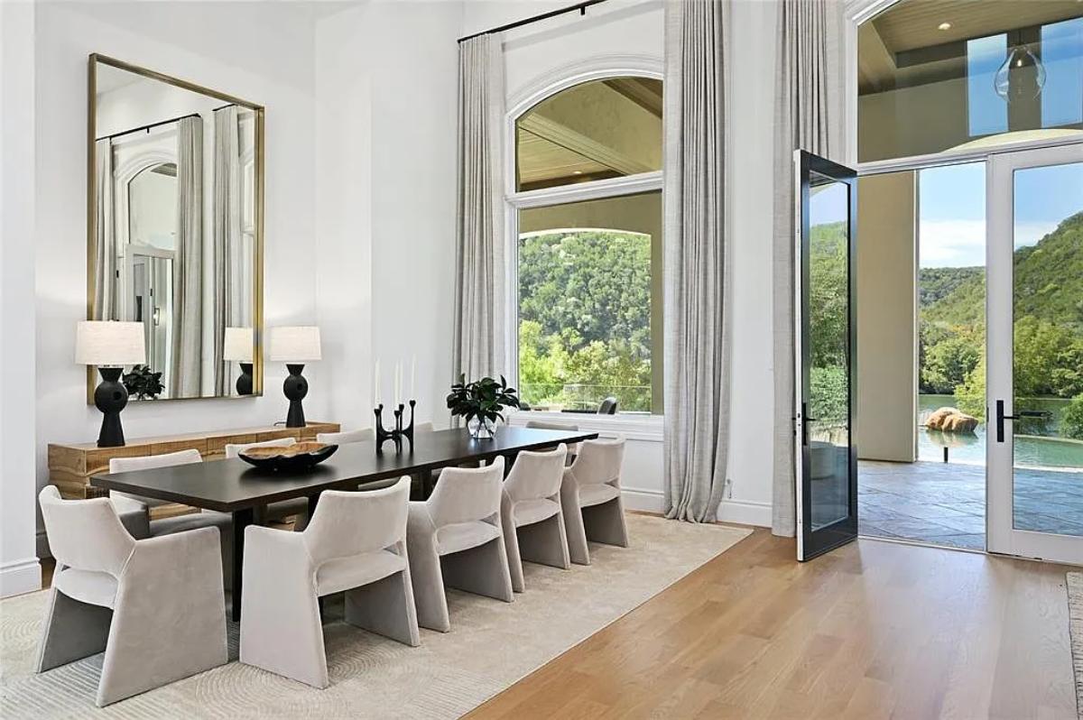 Dining room with a large wood table.