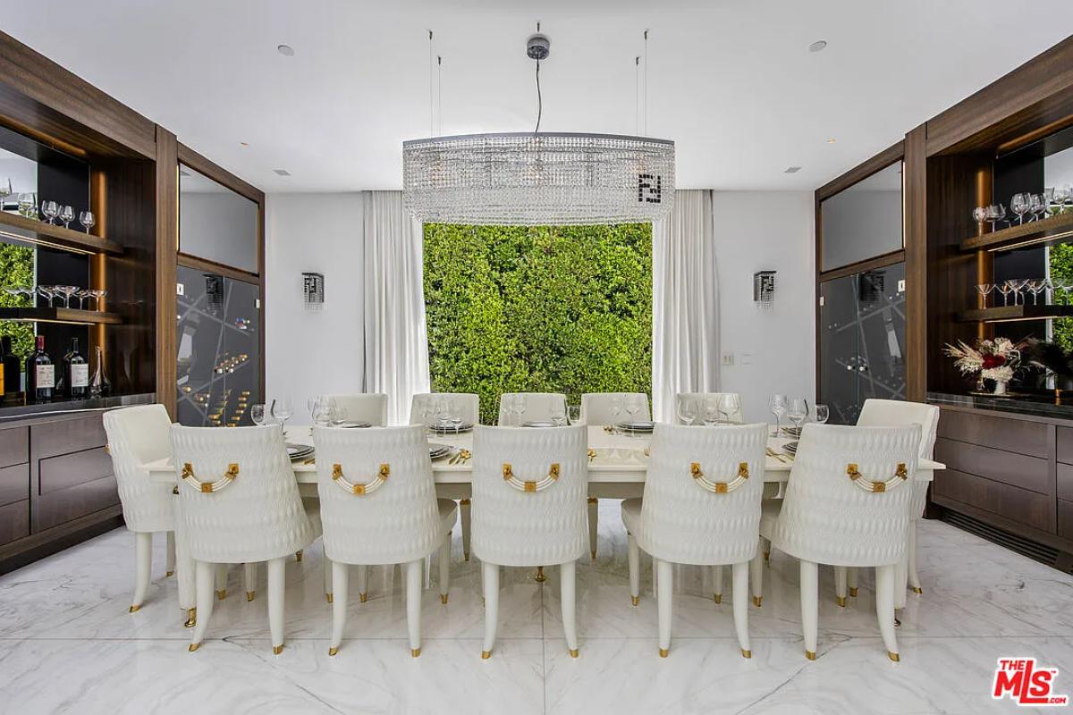Dining room with a chandelier.