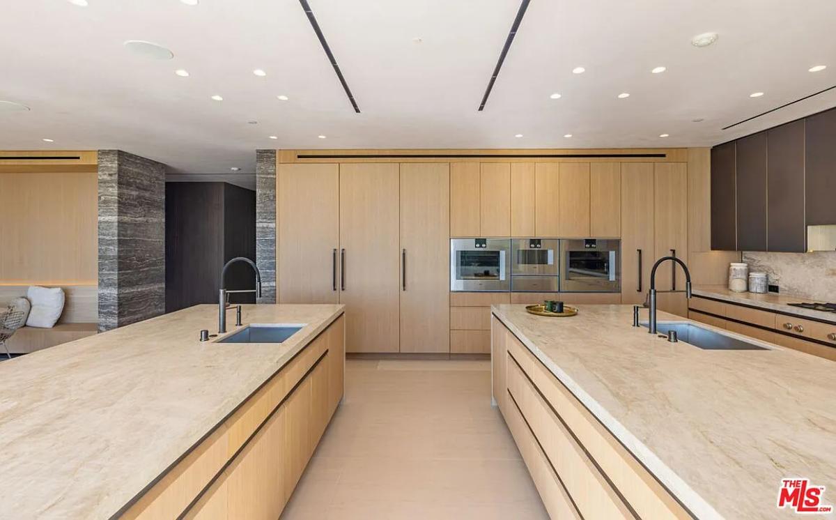 Kitchen with dual island prep areas.
