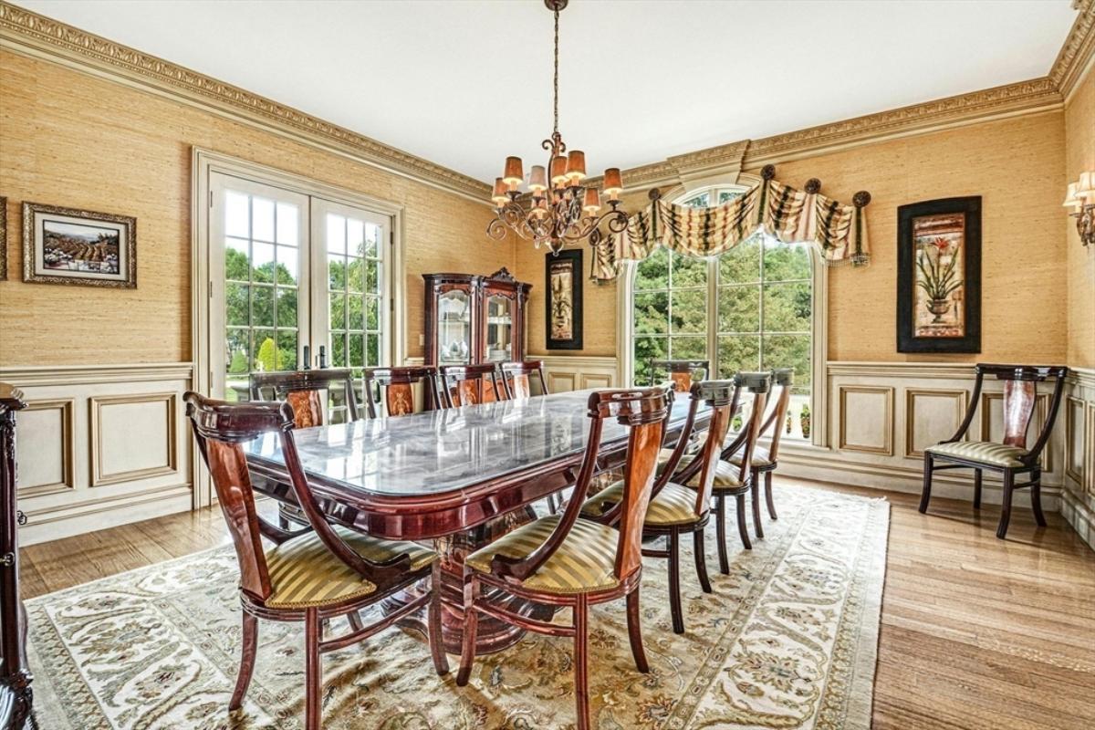 Dining room with a large table.