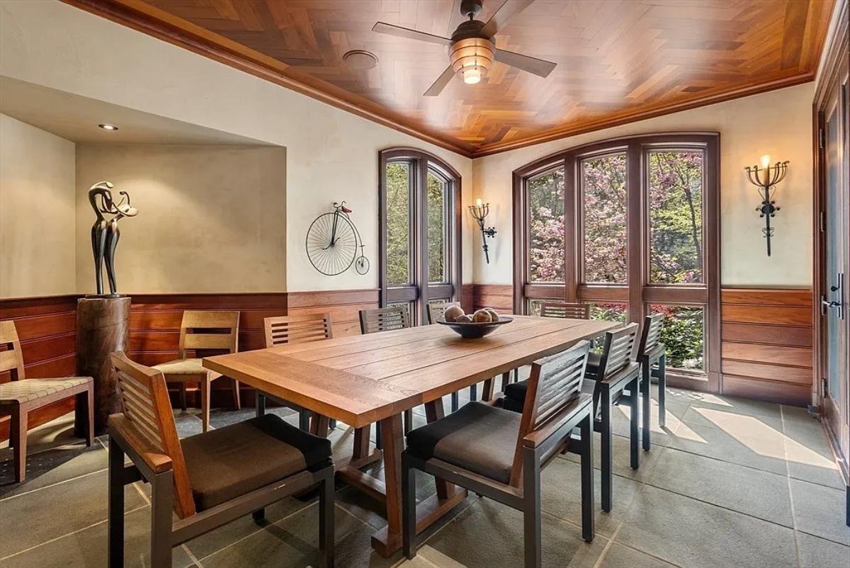 Dining room with a large wood table.
