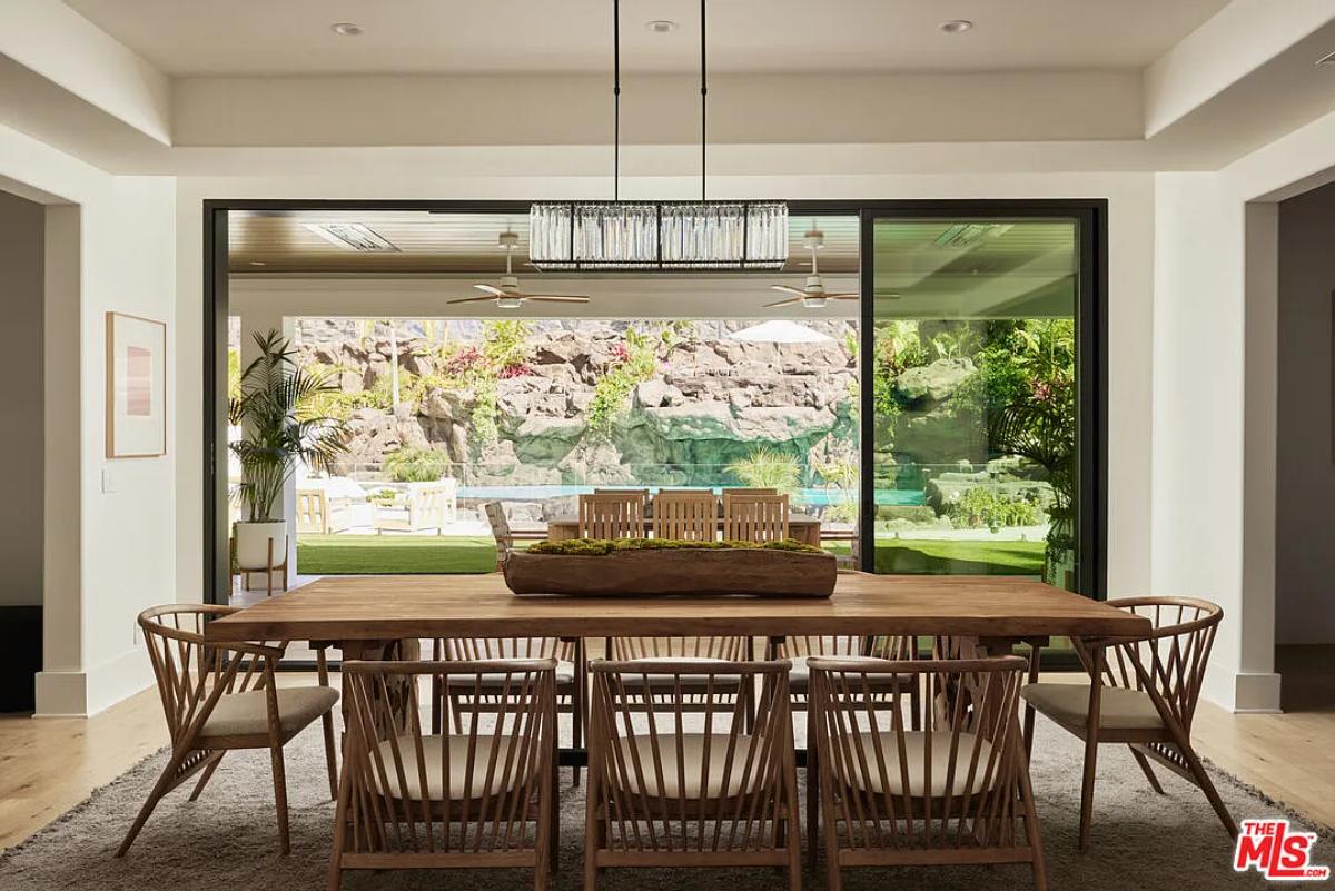 Dining room with a large wood table.