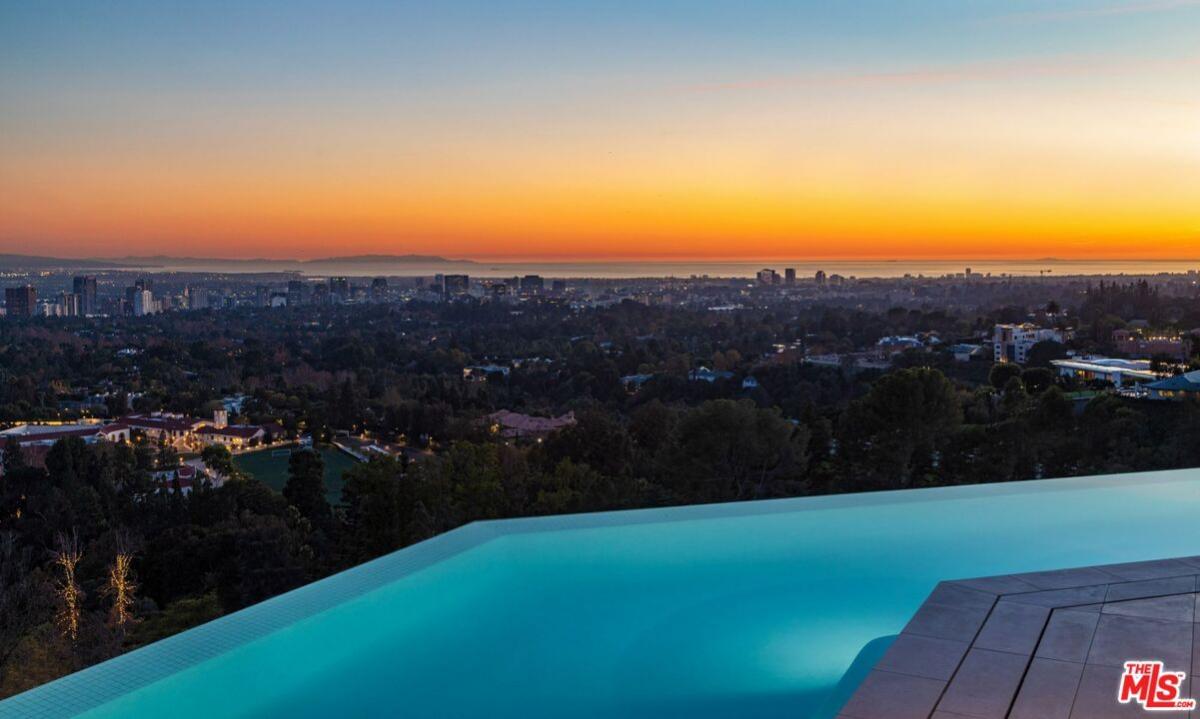 Infinity pool with city views.
