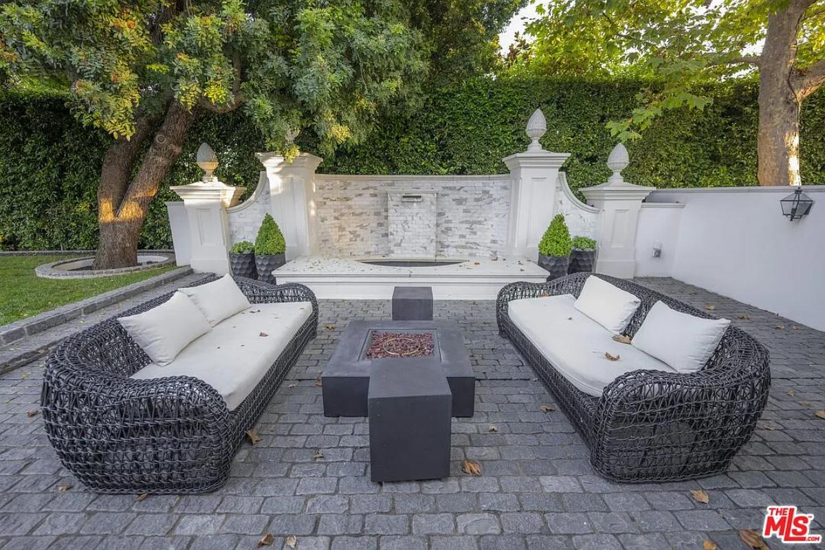 Outdoor living space with a fire pit.