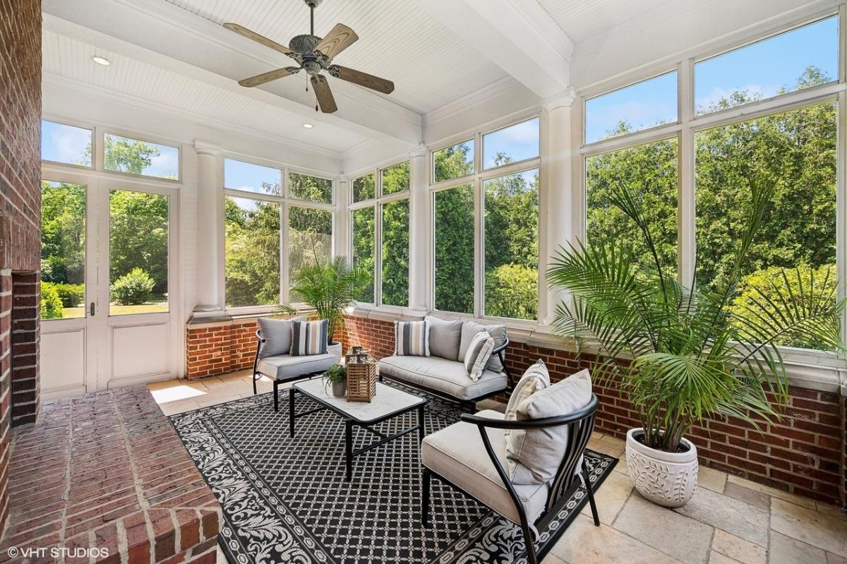 Sunroom with glass windows.