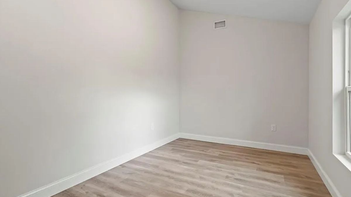 A home office with a window.