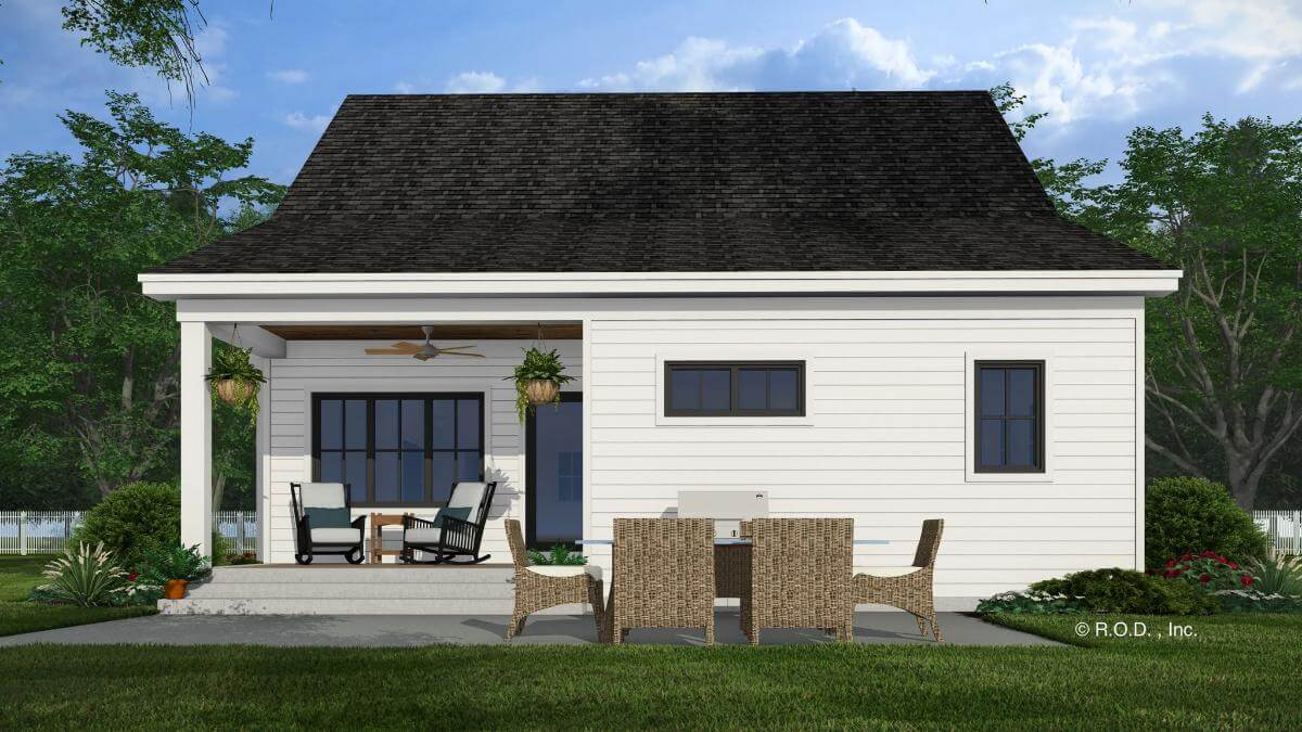 Rear view with a covered porch and a concrete patio.