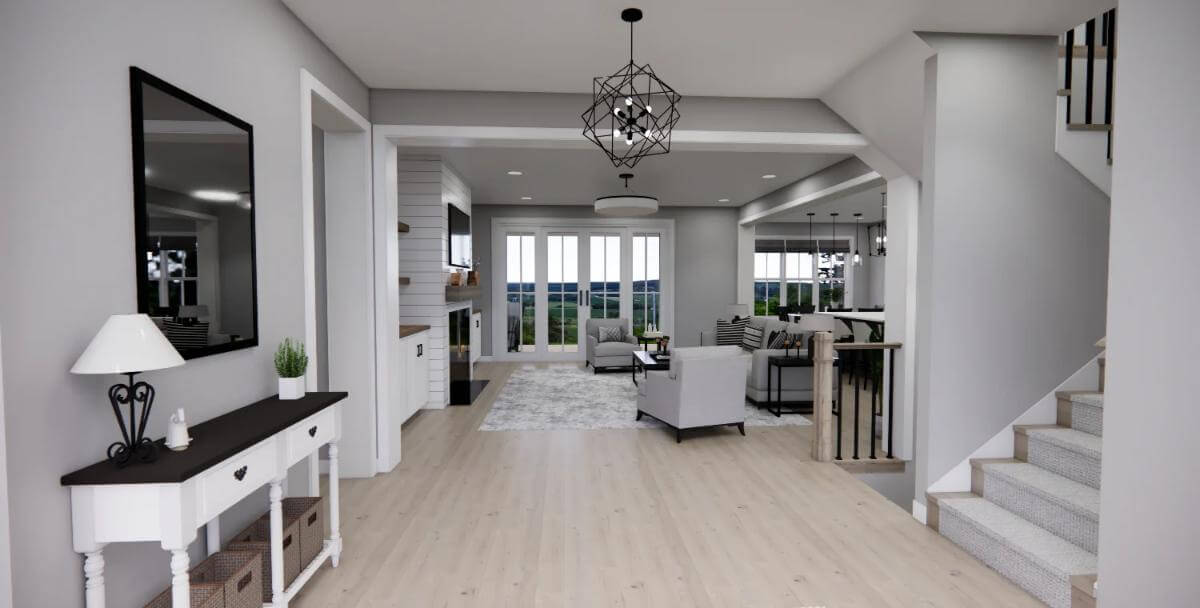 Foyer with a console table topped by a wall mirror.