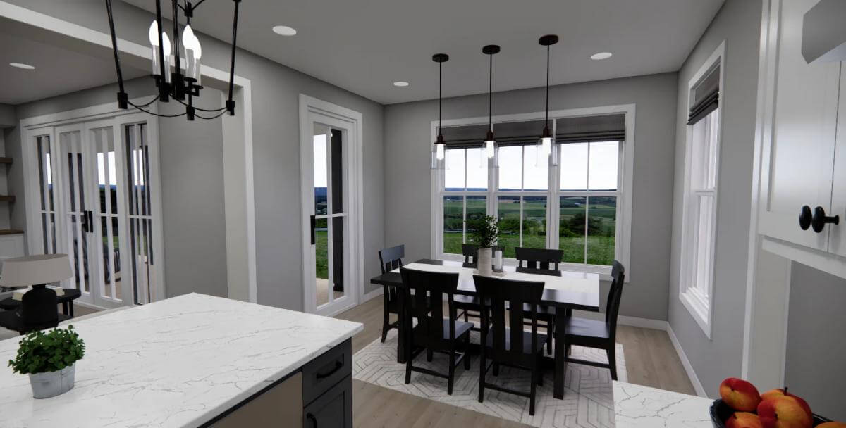 Dining room with a dark wood dining set and surrounding windows.