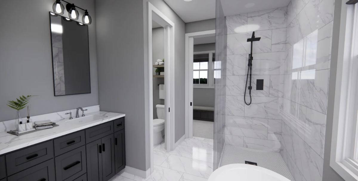 Primary bathroom with a dual sink vanity, a bathtub, a tiled shower, and a water closet.
