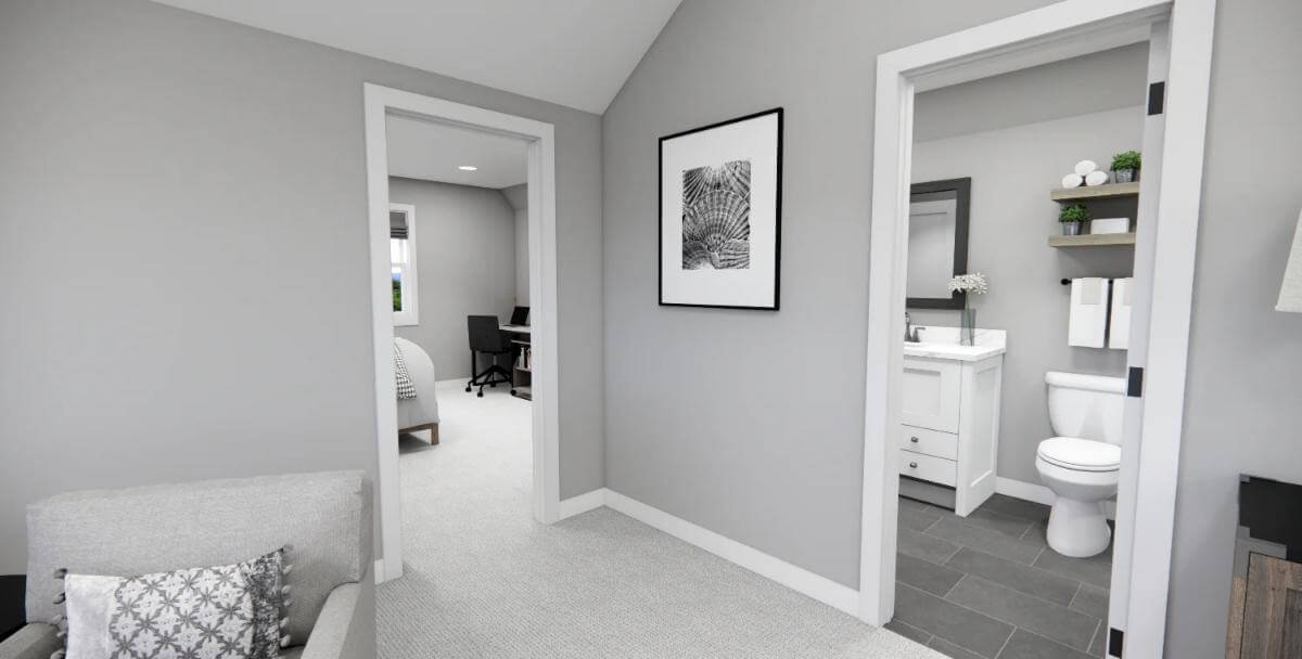Ensuite bathroom with slate flooring and gray walls.