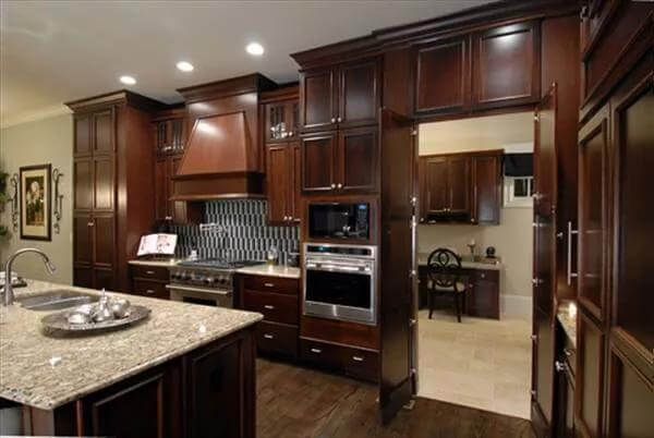 The kitchen includes double wall ovens and easy access to the laundry room.