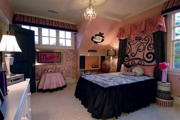 Bedroom with a skirted bed, pink walls, and a carpeted floor.