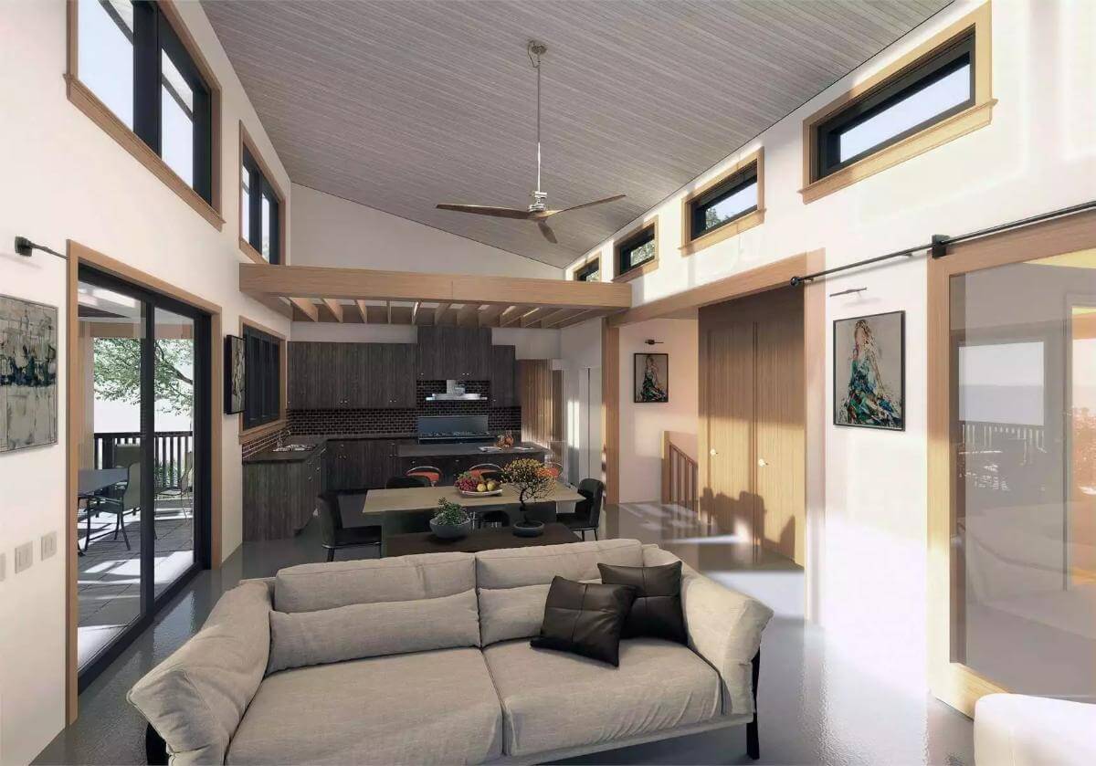 Great room with a gray sofa and clerestory windows.