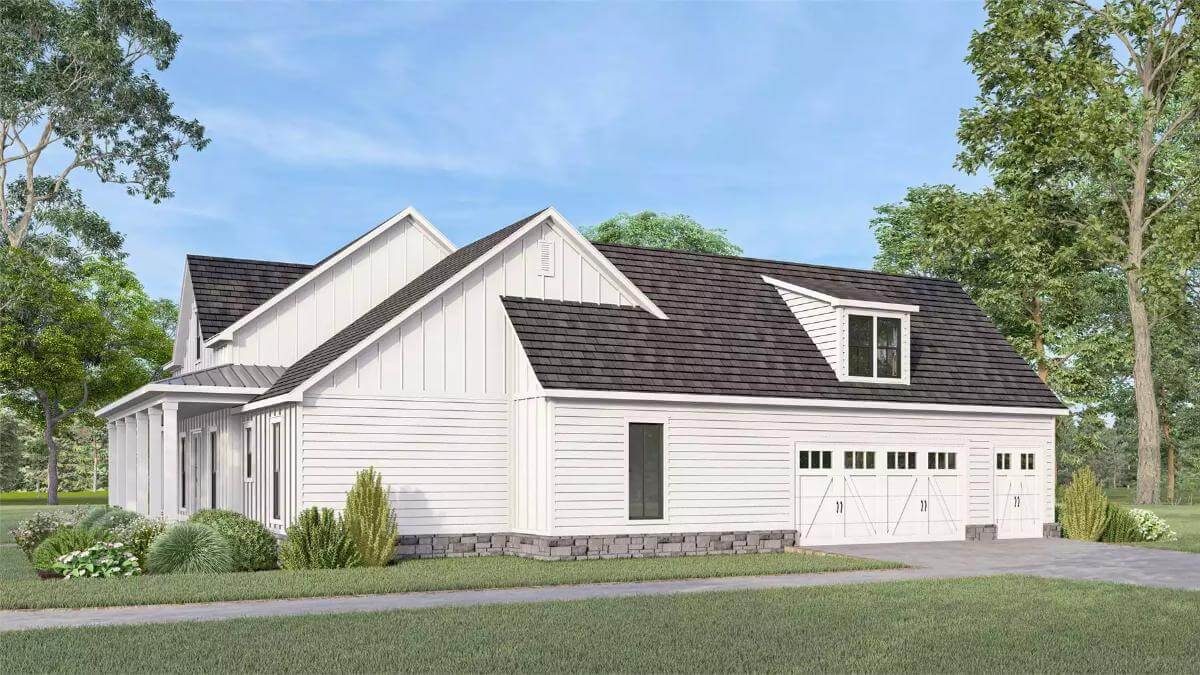 Right view with a double garage and storage room topped by a shed dormer.