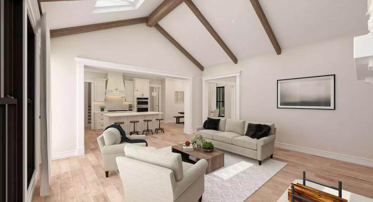 The living room connects to the kitchen through a large opening.