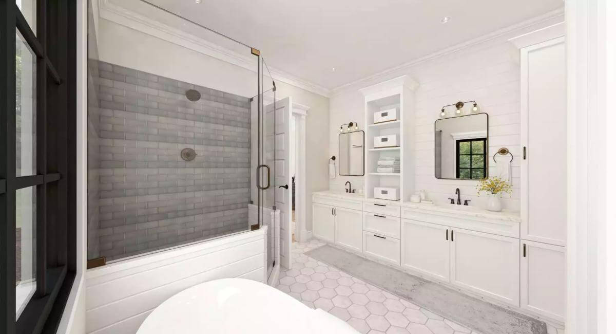The primary bathroom includes a dual sink vanity incorporated by linen closets.