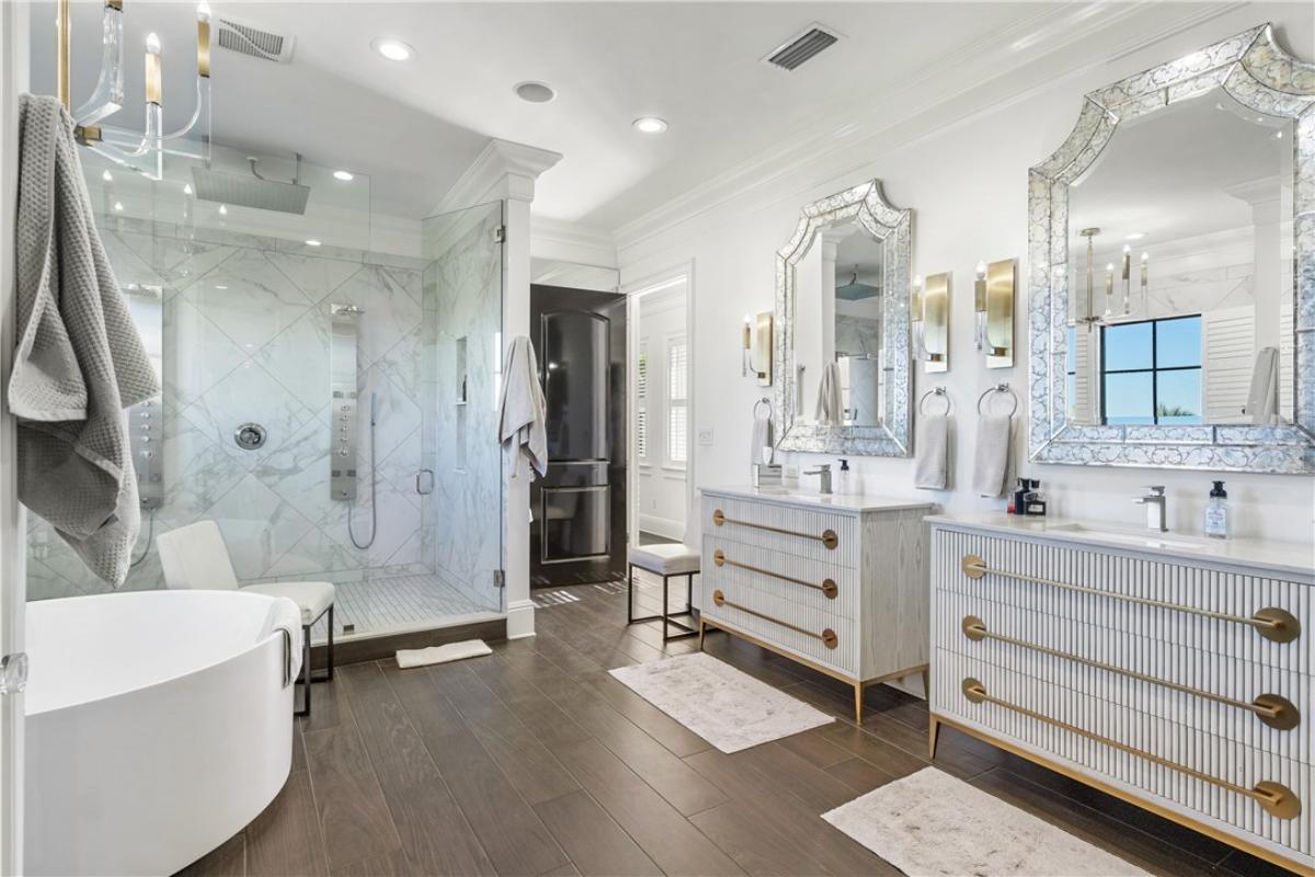 Bathroom with a soaking tub and a walk-in shower.