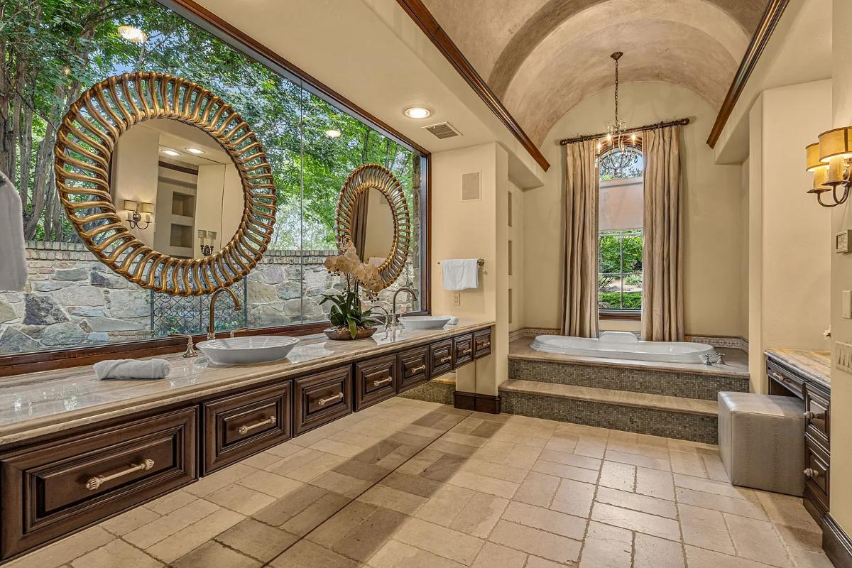 Bathroom with a custom-made vanity and a soaking tub.