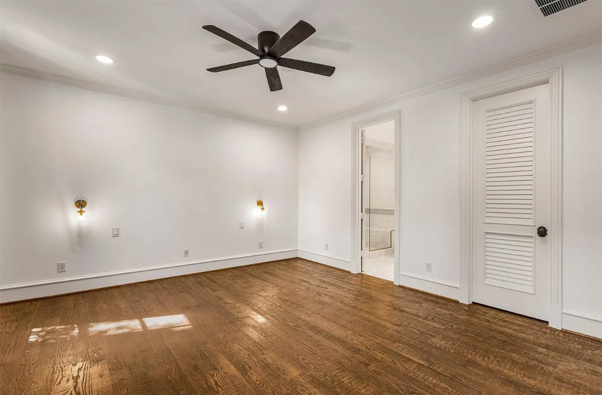 Bedroom with hardwood floors.