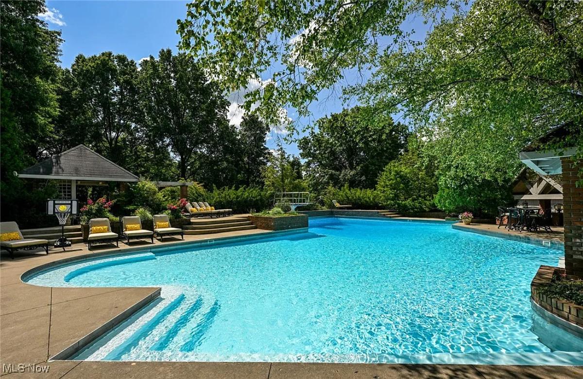 Pool with lounge chairs.