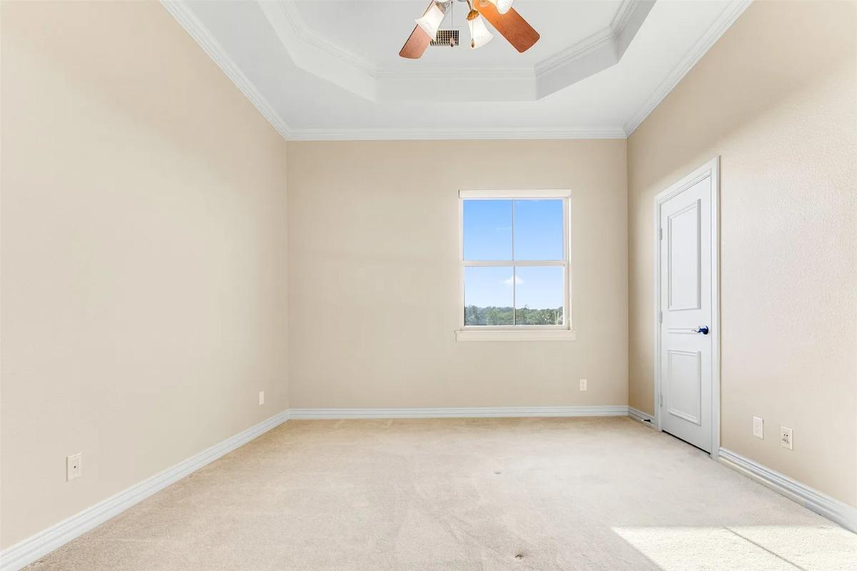 Bedroom with carpet flooring.