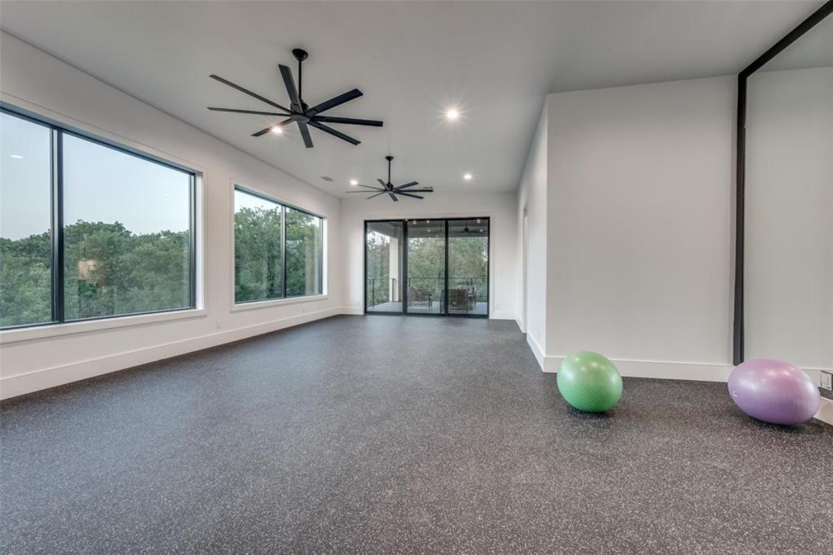 Exercise room with glass windows.