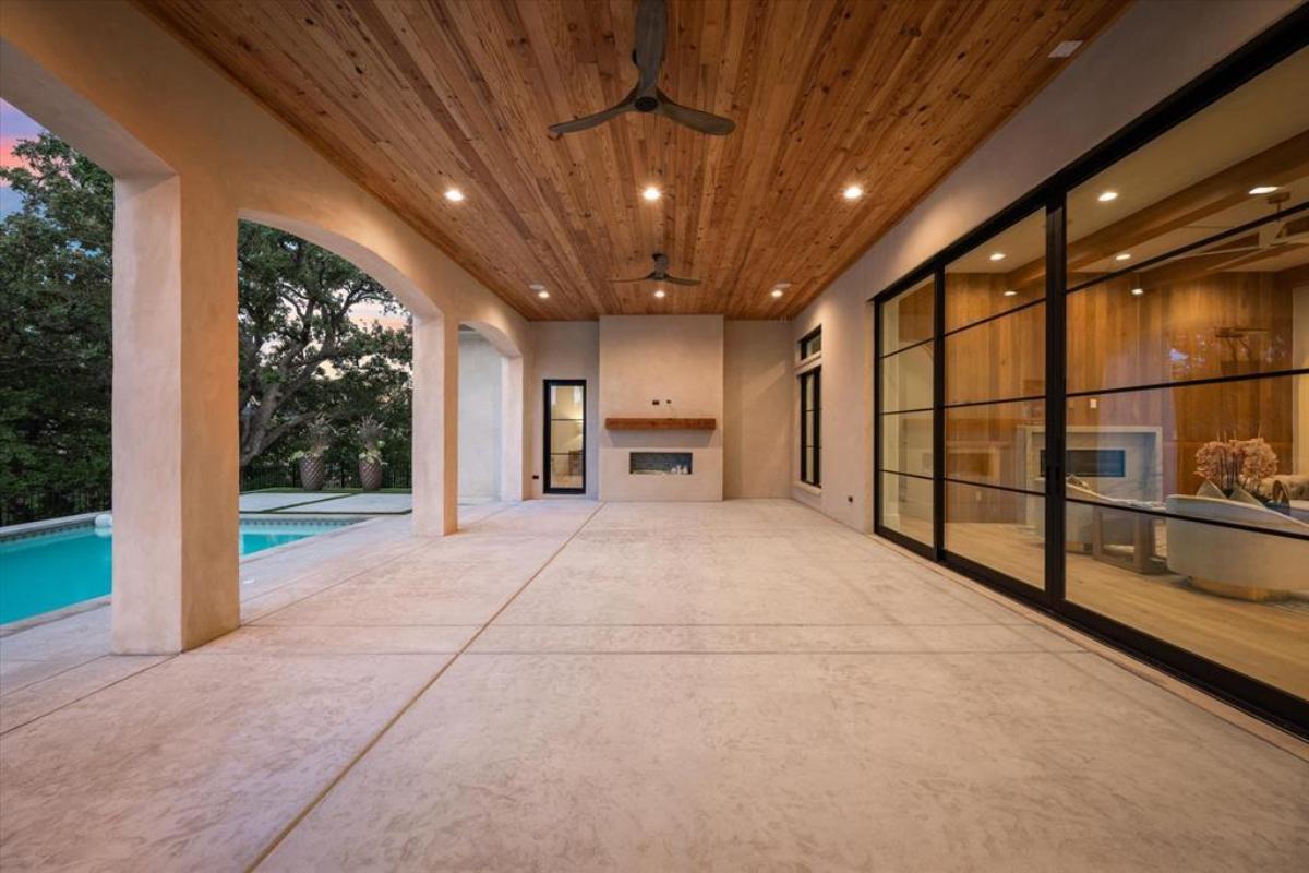 Outdoor living space with a fireplace.