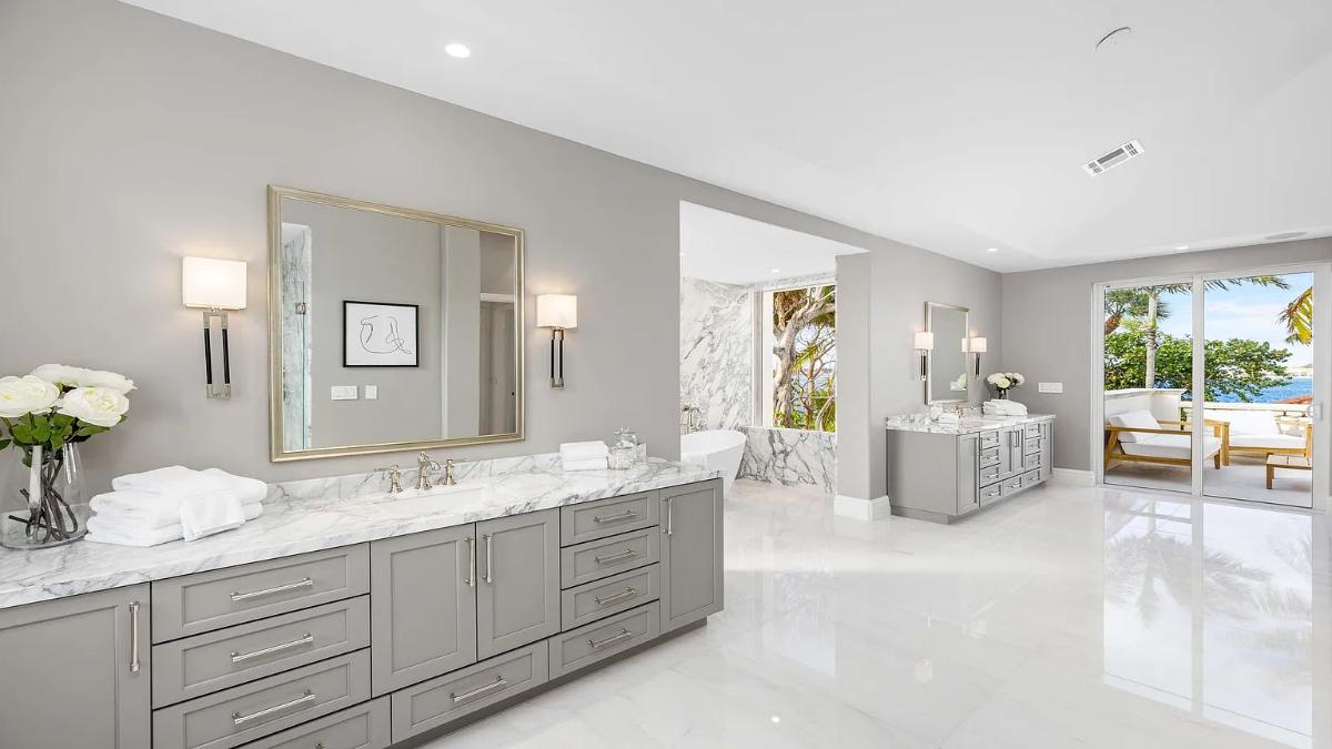 Bathroom with a custom-made vanity and a soaking tub.