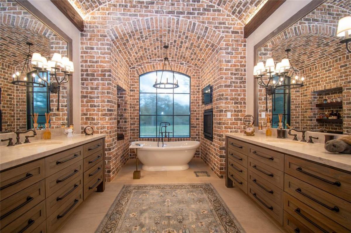 Bathroom with a custom-made vanity and a soaking tub.
