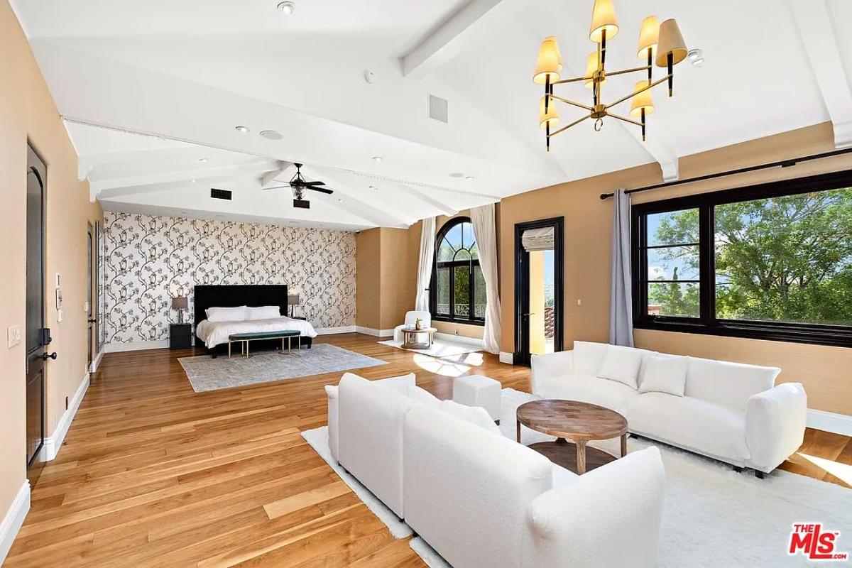 Bedroom with a living space.