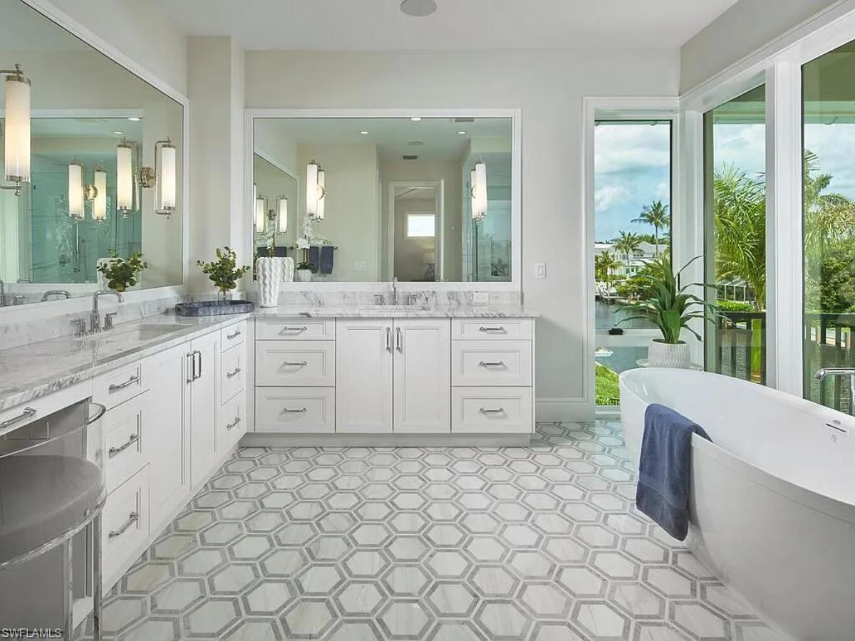 Bathroom with a custom-made vanity and a soaking tub.