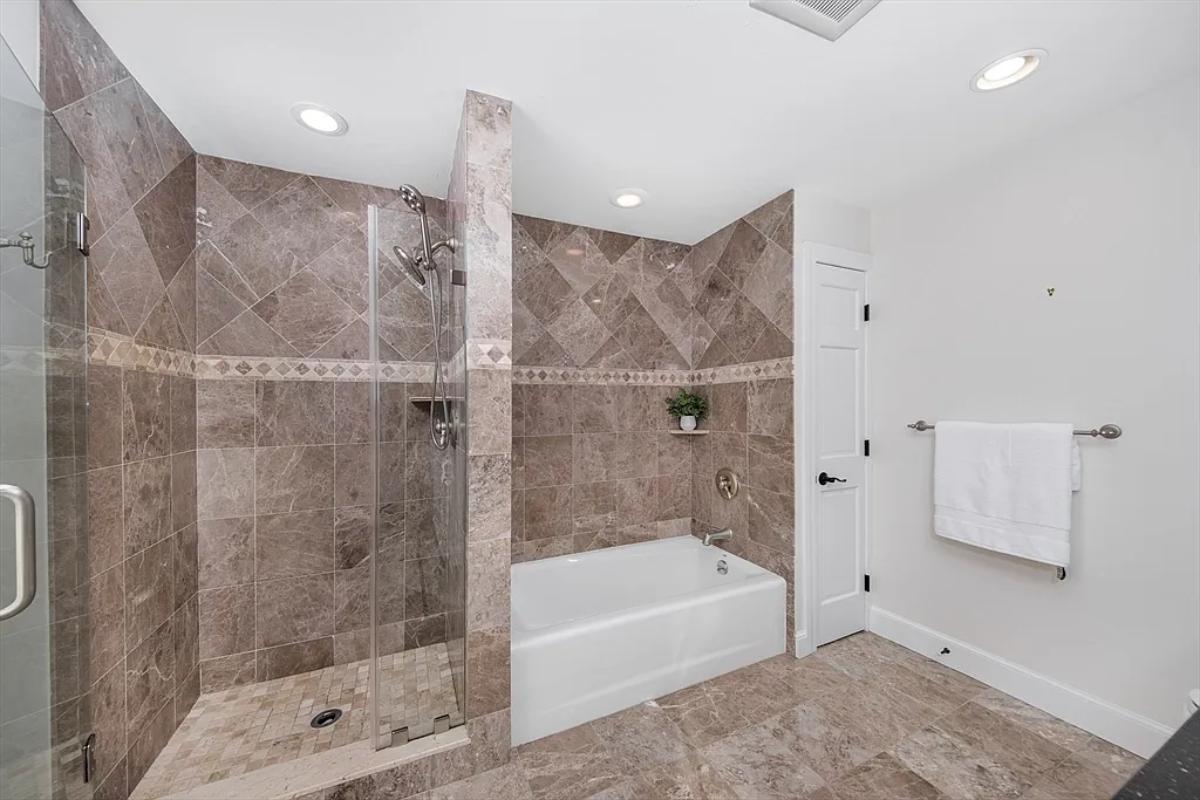 Bathroom with a walk-in shower.