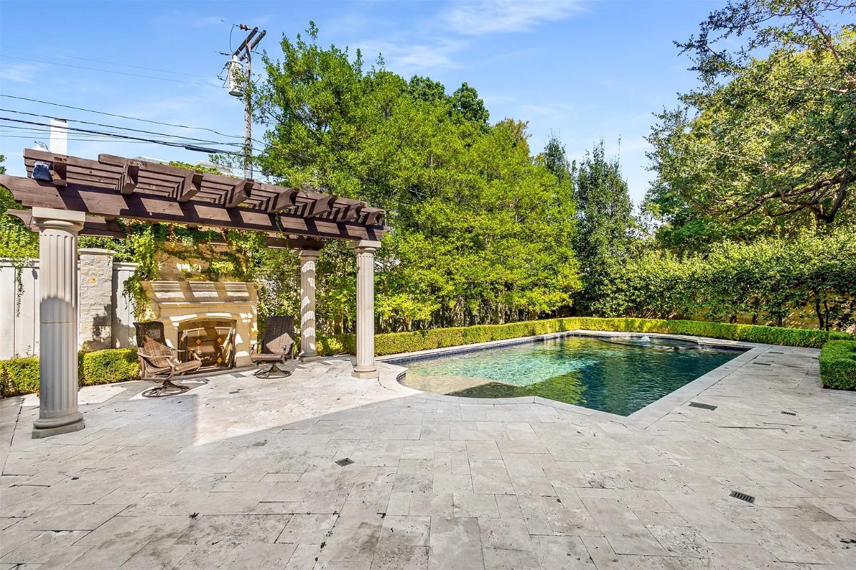 Pool with a pergola.
