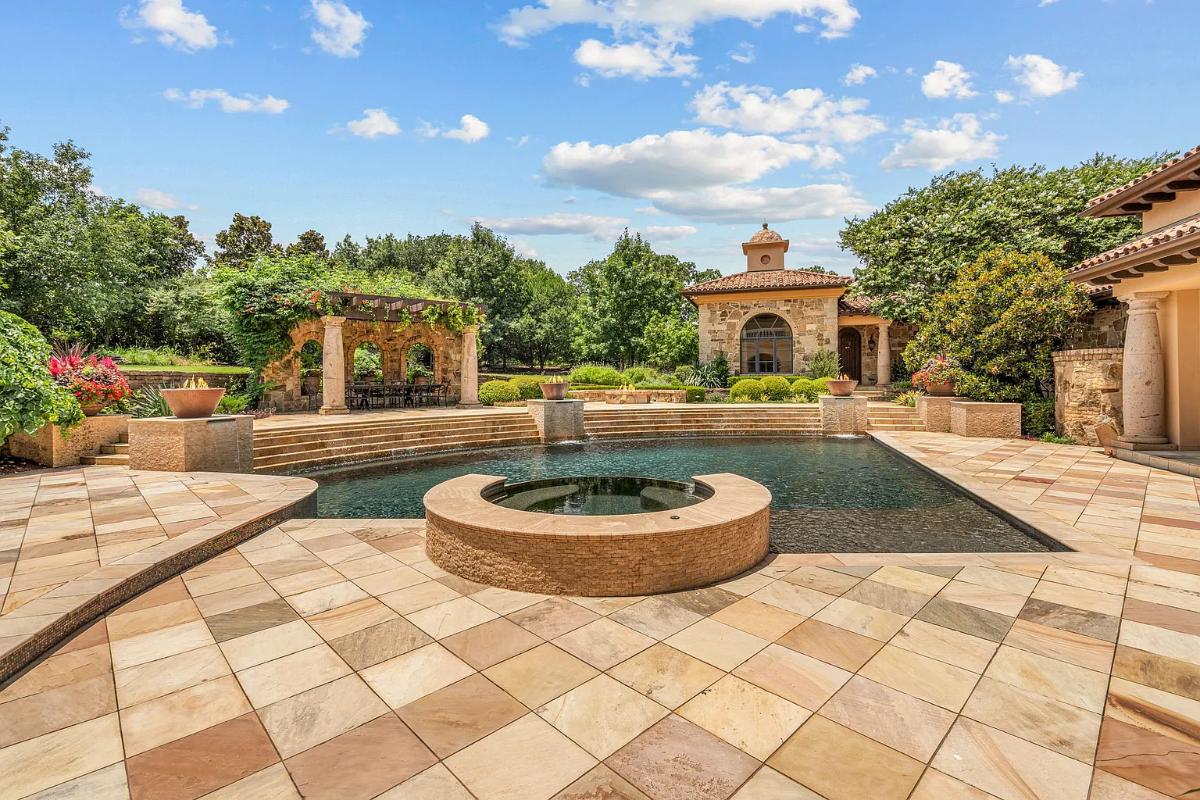 Pool with a jacuzzi.