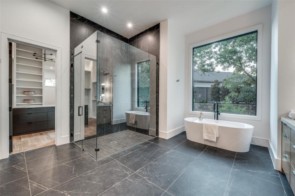 Bathroom with a soaking tub and a walk-in shower.