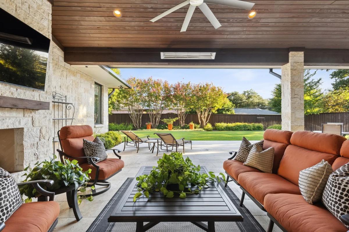 Outdoor living space with a TV.