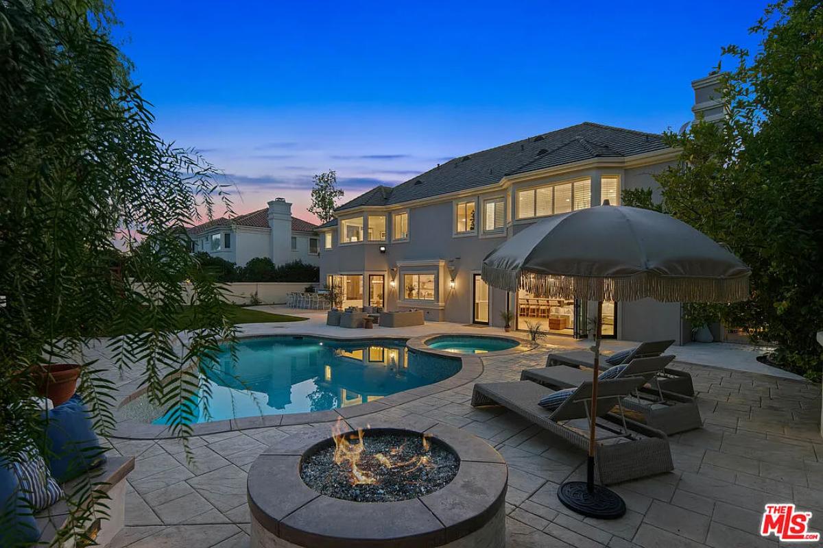 Pool with a fire pit.