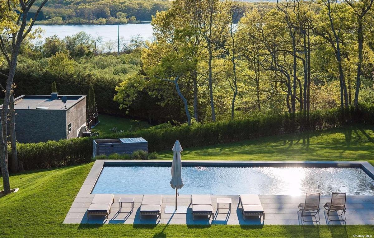 Pool with lounge chairs.