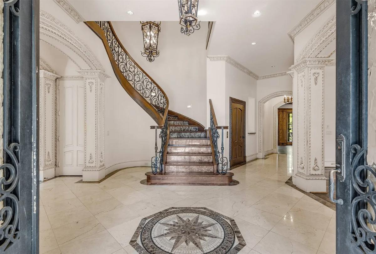 Foyer with metal doors.