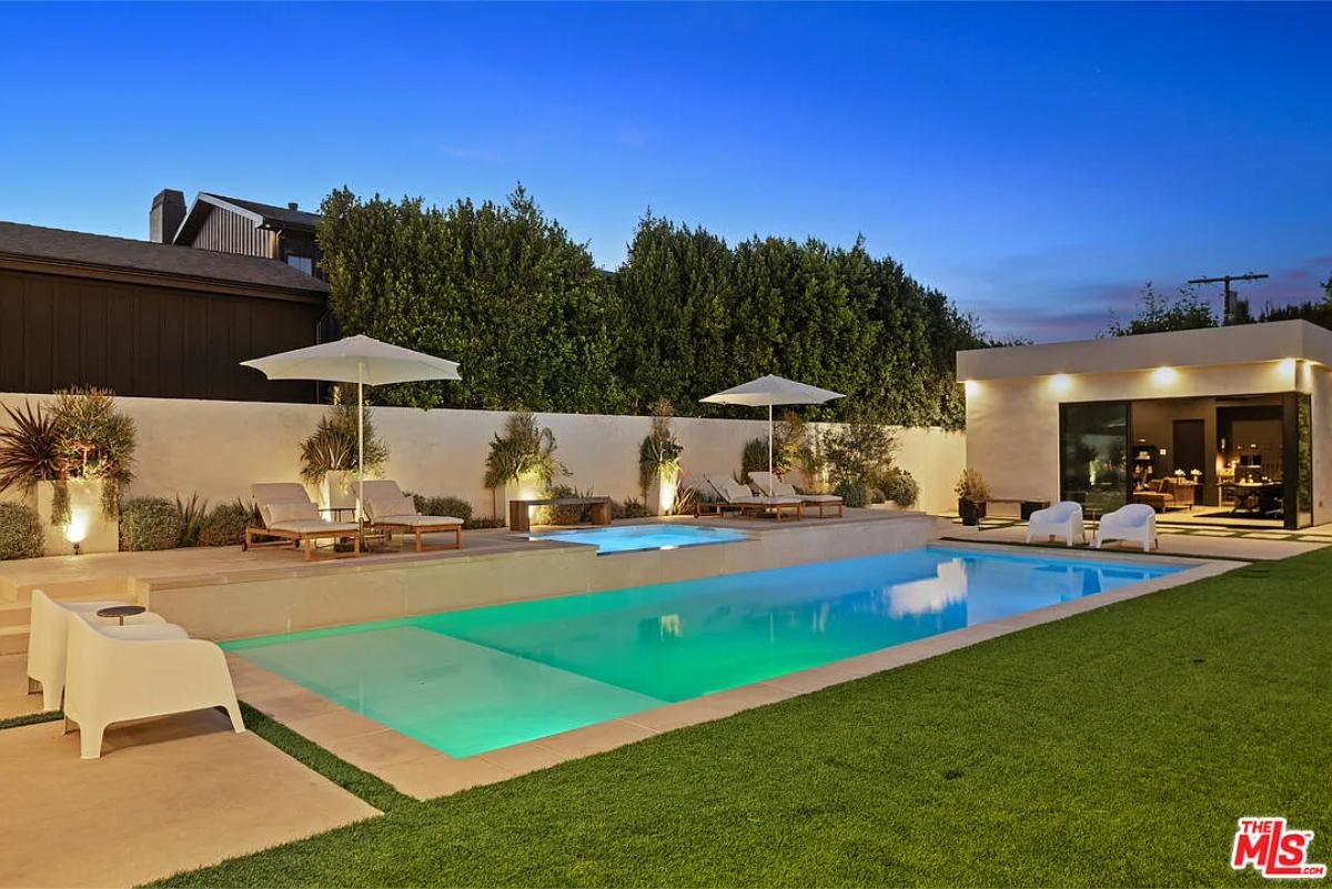 Pool with lounge chairs.