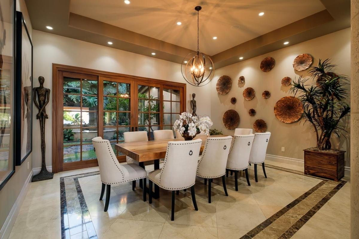 Dining room with a chandelier.