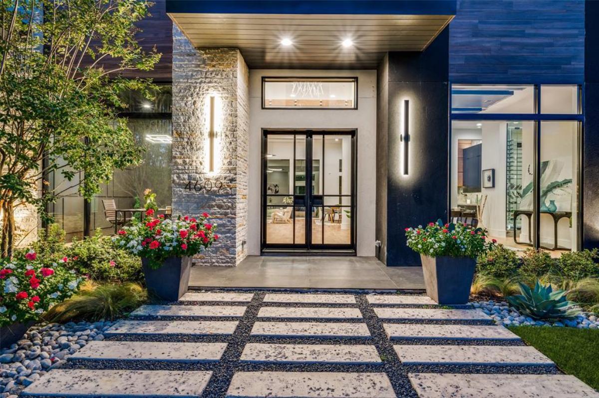 Front entry of the mansion with a glass door.