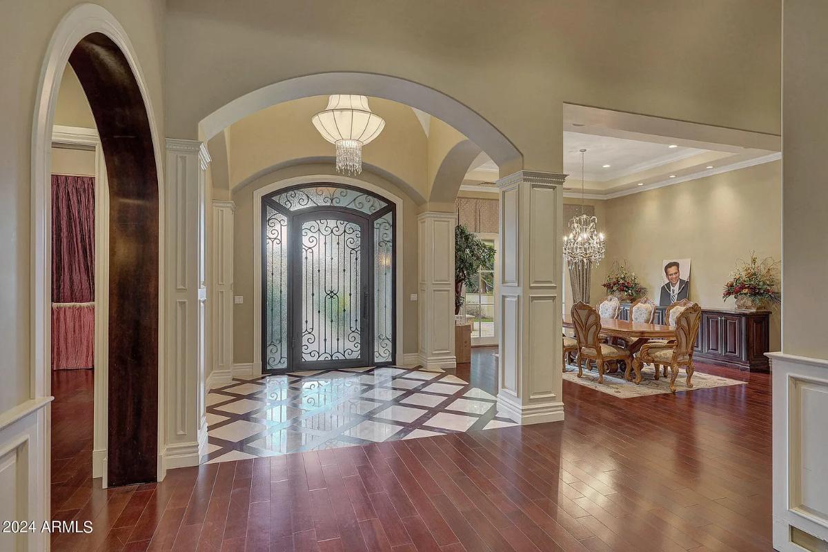 Foyer with a chandelier.